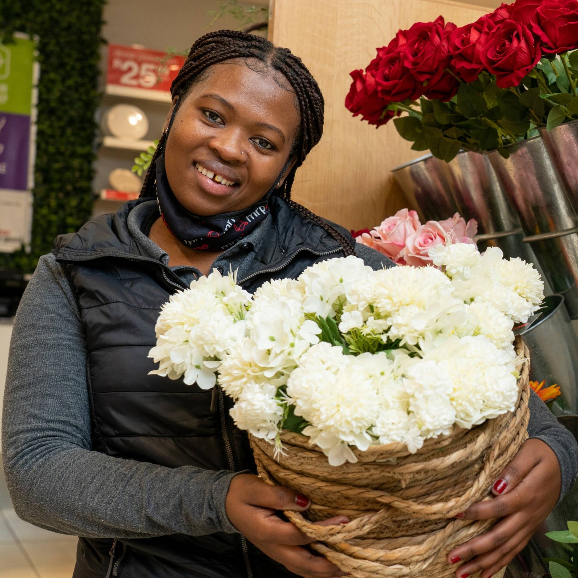 Yamkela Skuni holding flowers